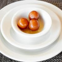 Gulab Jamun · Succulent treats from the north made of special dough, fried and served in sugary syrup