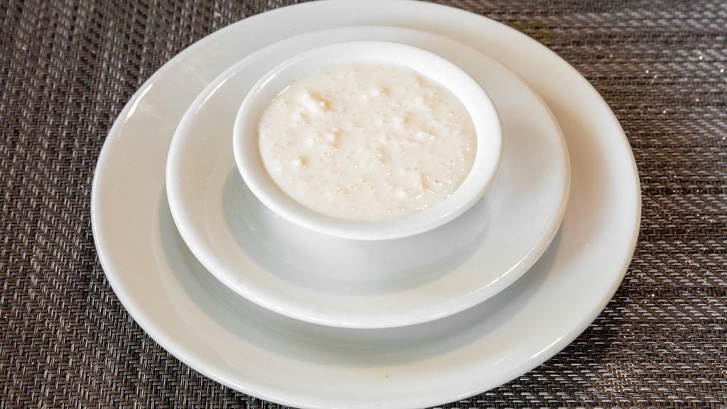 Rice Kheer · Rice pudding garnished with nuts and raisins