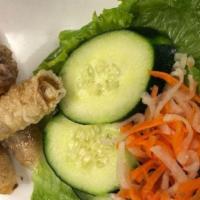 2 Vietnamese Egg Roll · Most popular. Crispy egg roll stuffed with marinated pork and sliced vegetables.