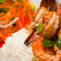 Grilled Jumbo Shrimp Rice Plate · Served with steamed rice and veggies.