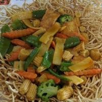 Vegetarian Pan Fried Noddles · Crispy egg noodles toppled with vegetables