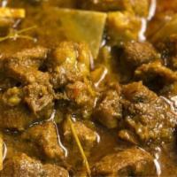 Small Curried Goat · Insanely delicious slow-cooked goat meat Jamaican spiced curry that is full of flavor and te...