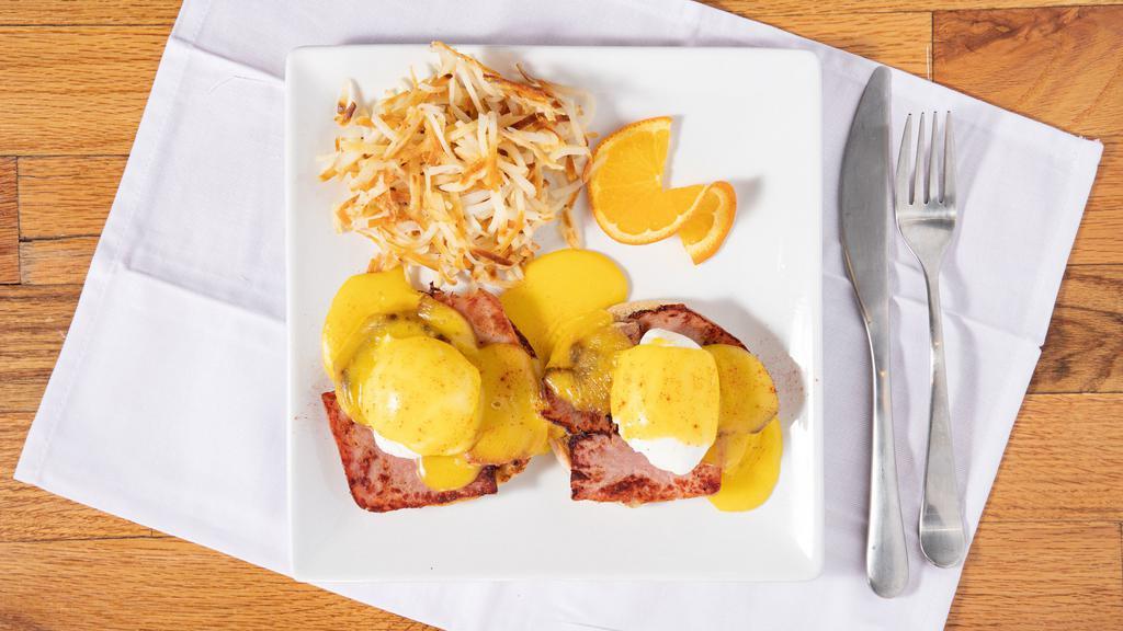 Traditional Eggs Benedict (B & D Benedicts) · Two poached eggs on an English muffin topped with hollandaise. Served with hash browns or grilled tomato. Canadian bacon. Two poached eggs on an english muffin topped with hollandaise. Served with hash browns or grilled tomato.