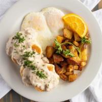 Biscuits And Gravy · two buttermilk biscuits smothered in homemade pork sausage gravy. Served with two eggs any s...