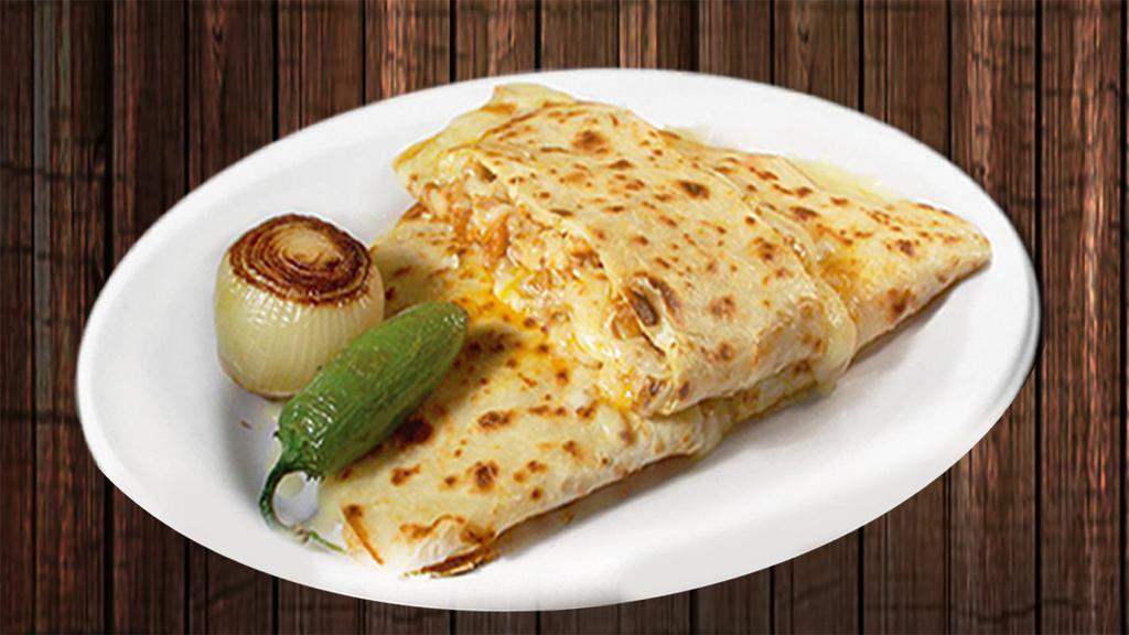 Quesadilla Apppetizer · Flour tortilla filled with melted cheese, with your choice of meat, onions, cilantro and salsa. Sour cream, guacamole additional charge.