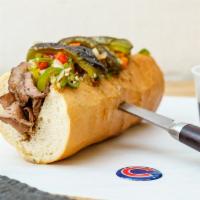 Chicago Italian Beef · Classic Chicago

House roasted thin sliced beef stuffed in a toasted baguette with giardinie...