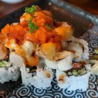 Volcano Roll · Tempura Salmon, Cucumber topped w/Baked Shrimp & Scallop, Masago, Green Onion, Spicy Mayo, U...