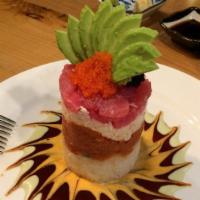 Ahi Tuna Tower · Seasoned Rice, Crab Salad, Spicy Tuna, Avocado, Tuna, Salsa, Three kinds of Tobiko w/Unagi s...