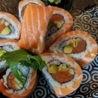 Sake Bomb Roll · Spicy Tuna, Cucumber & Avocado wrapped w/Fresh Salmon