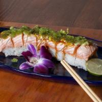 Sumo Roll · Real Crab, Pickled Jalapeno topped w/Torched Salmon, Wasabi Tobiko, Sprouts, Wasabi Mayo & U...