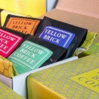 The Yellow Brick (Variety Box) · Taste the variety of our roaster's choice coffees: four individual 4 oz bags, packaged insid...