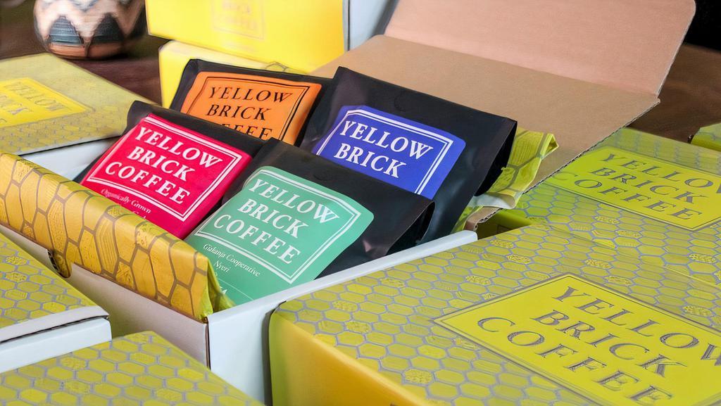 The Yellow Brick (Variety Box) · Taste the variety of our roaster's choice coffees: four individual 4 oz bags, packaged inside one box.
