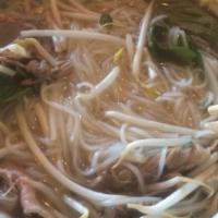 Pho Shrimp (Tom) · Rice noodle soup with Shrimp served basil , beansprout, limes.