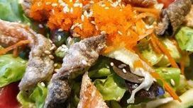 Salmon Skin Salad · Mixed greens, bonito flake, cucumber, gobo, ponzu sauce.