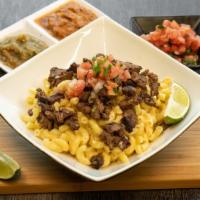 Carne Asada Mac And Cheese · A Latino take on the traditional Mac and Cheese. Homemade Macaroni and Cheese, Topped with F...