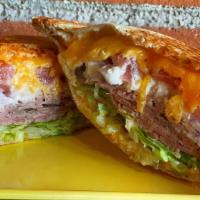 No 35* · Thinly sliced roast beef, cheddar, tomatoes, shaved red onions, shredded lettuce, Zookz Hors...