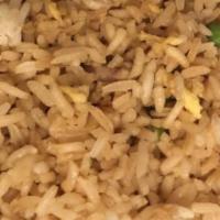 Chicken Fried Rice · It is prepared with steamed rice, tossed in the wok with soy sauce, egg, green peas, and car...