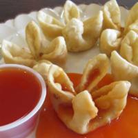 Cream Cheese Wonton · It is prepared with wonton skin wrapped with cream cheese and served with side of sweet and ...