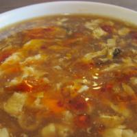 Hot & Sour Soup · It is prepared with tofu, black fungus, bamboo shoot, pork and egg, mixed with spicy and sou...