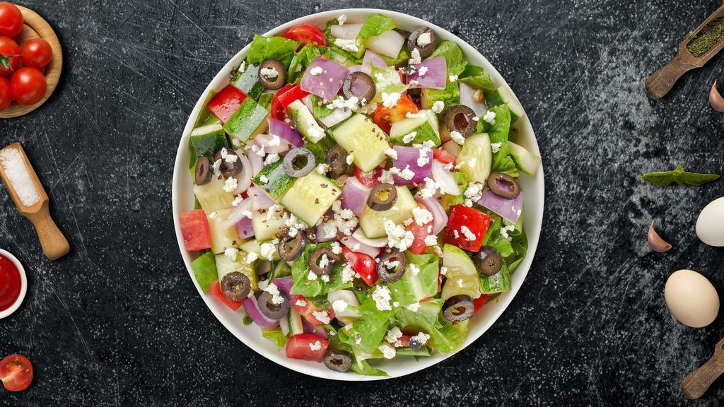 The Big Fat Greek Salad · (Vegetarian) Romaine lettuce, cucumbers, tomatoes, red onions, olives, and feta cheese tossed with balsamic vinaigrette dressing.