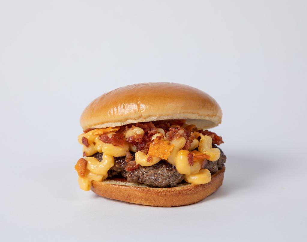 Mac N’ Cheese Burger · Mac n' cheese, cheese crackers, bacon bits and your choice of additional toppings.