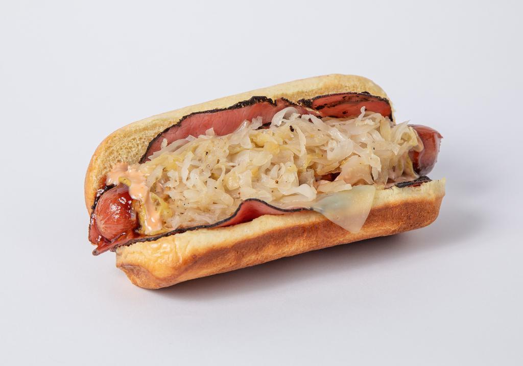 Reuben Dog · Mugsy dog, mugsy sauce, fry sauce, spicy brown mustard, sauerkraut, Swiss cheese and pastrami.