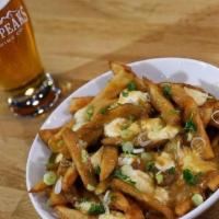 Poutine · Beer-battered fries,  green chile gravy, white cheddar curds and green onions. . Sunny-side ...