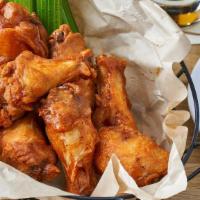 Brickhouse Wings · Tossed in your choice of buffalo, Golden Stout BBQ, Sweet Chili Peach, WoW Citrus Chili, Buf...