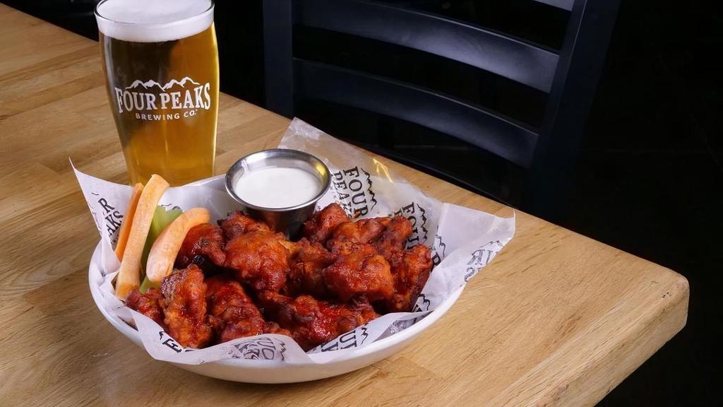 Boneless Wings · Tossed in your choice of buffalo, Golden Stout BBQ, Sweet Chili Peach, WoW Citrus Chili, Buffa-hellno (***HOT***), Dry Rub Peaks Style or Desert Dry Heat.