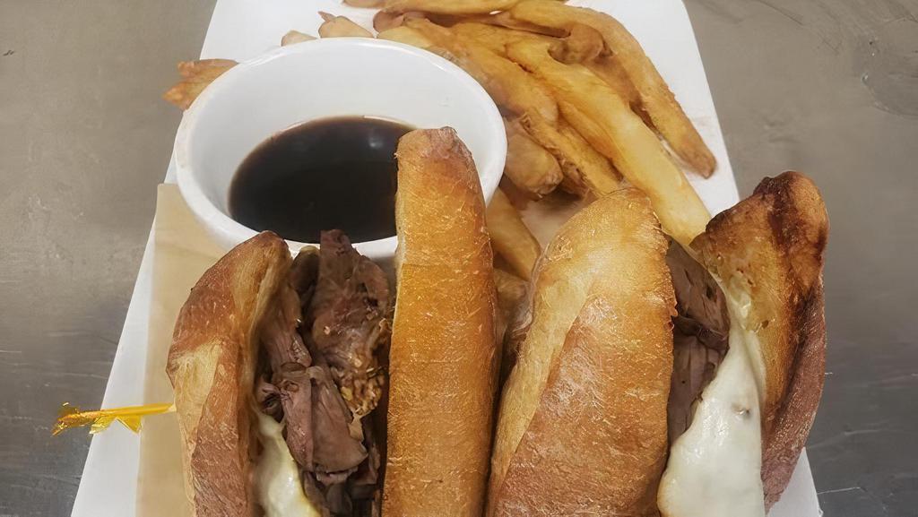 Brewer'S Dip · Oven-roasted beef on a toasted baguette with melted muenster cheese and hop knot mustard horseradish sauce. Served with au jus.