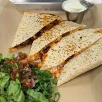 Adovada Quesadilla · Chunks of tender, slow smoked red chili pork, cheddar and mozzarella cheese blend melted in ...
