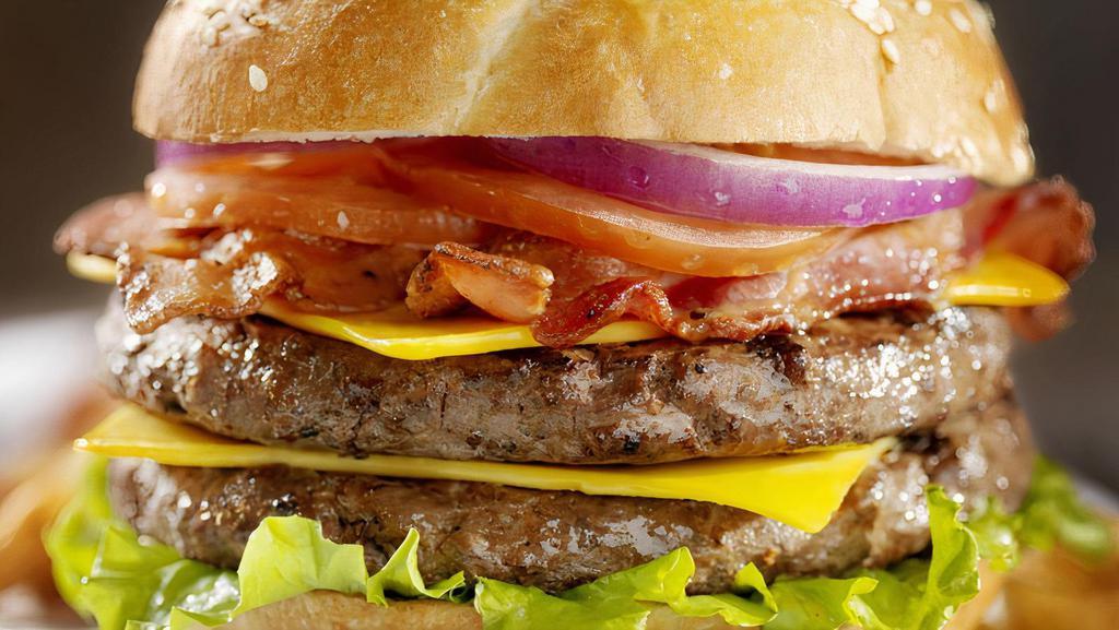 Classic Cheeseburger · homemade beef patty. cheese,tomato,lettuce,onions,pickles,mayo,
