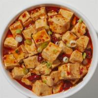 Mapo Tofu · Tofu, peas, carrots, onions, straw mushroom in a spicy dried chili pepper, chili paste in ou...