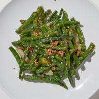 Chinese String Beans · Spicy chili sautéed with string beans in a chili garlic brown sauce….