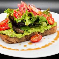 Avocado Toast · Fresh cherry tomato, sesame seeds, greens. Olive oil hint.