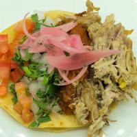 Carnitas Taco (Braised Pork) · Comes with pico de gallo, salsa, and red pickled onion.