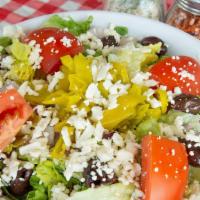 Mediterranean Salad (Large) · Fresh romaine lettuce, tomatoes, red onions, pepperoncini, kalamata olives, and feta. Served...