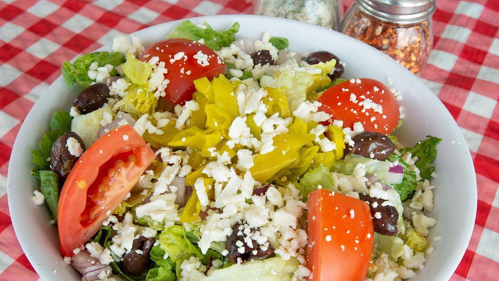 Mediterranean Salad (Large) · Fresh romaine lettuce, tomatoes, red onions, pepperoncini, kalamata olives, and feta. Served with vinaigrette dressing.