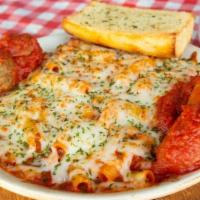 Baked Ziti · Served with meatball or sausage, garlic bread, and salad.