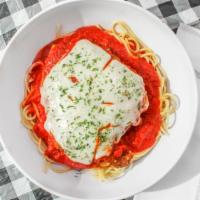 Chicken Parmesan · Served with side of spaghetti, garlic bread, and salad.