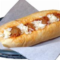 Meatball Sub · Topped with homemade marinara and mozzarella. Served on an 8