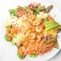 Fins Cobb-O · Char-grilled shrimp with mixed greens, avocado, carrots, tomato, Cheddar jack, hard-boiled e...