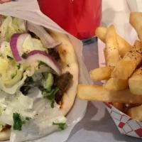 Value Combo Meal  · Any Sndwiches , handmade pita, soda and your choice of fries, rice, or salad.