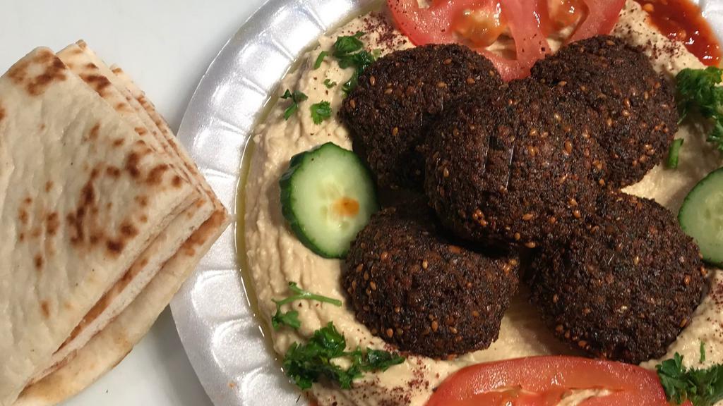 Falafel Hummus Mixed Platter · Five pieces falafel with hummus served with two pitas.