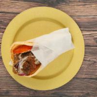 Gyros Pita -  Build Your Own · Layers of select beef and lamb, perfectly seasoned with zesty spices; broiled on a vertical ...