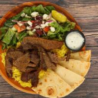 Gyros Entree · Layers of select beef and lamb, perfectly seasoned with zesty spices; broiled on a vertical ...