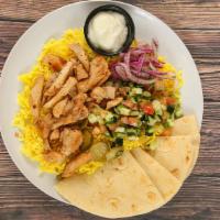 Chicken Shawarma Entree · Chicken breast marinated in our special Mediterranean seasonings, flame-broiled on a vertica...