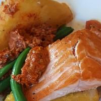 Salmon Entree · Perfectly seasoning salmon grilled to perfections, with choice of 2 sides. Served with a sau...