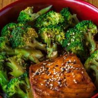 Teriyaki Salmon Bowl · Grilled Salmon steak, steam broccoli, Steam rice top with teriyaki sauce and sesame seeds.