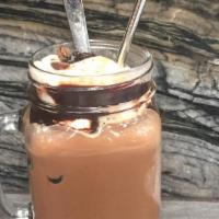 Iced Mocha · Aussie style iced mocha with ice cream, chocolate sauce, milk and house blend espresso